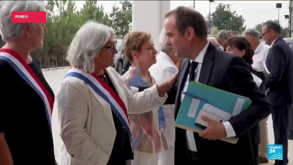 French PM announces support for fire-damaged villages after jeers from residents
