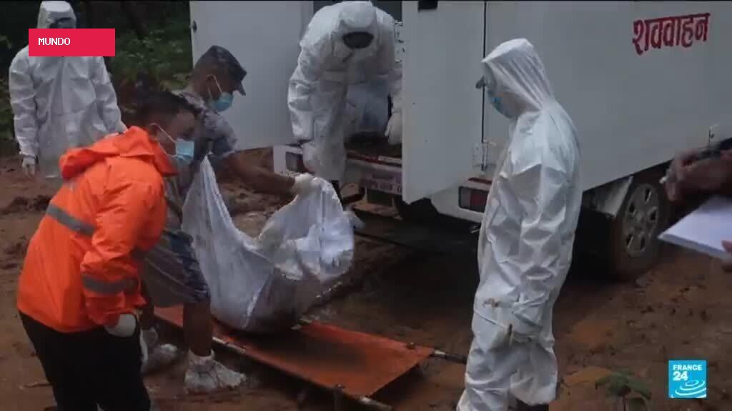 Mass burials held in Nepal as bodies wash up after catastrophic flooding