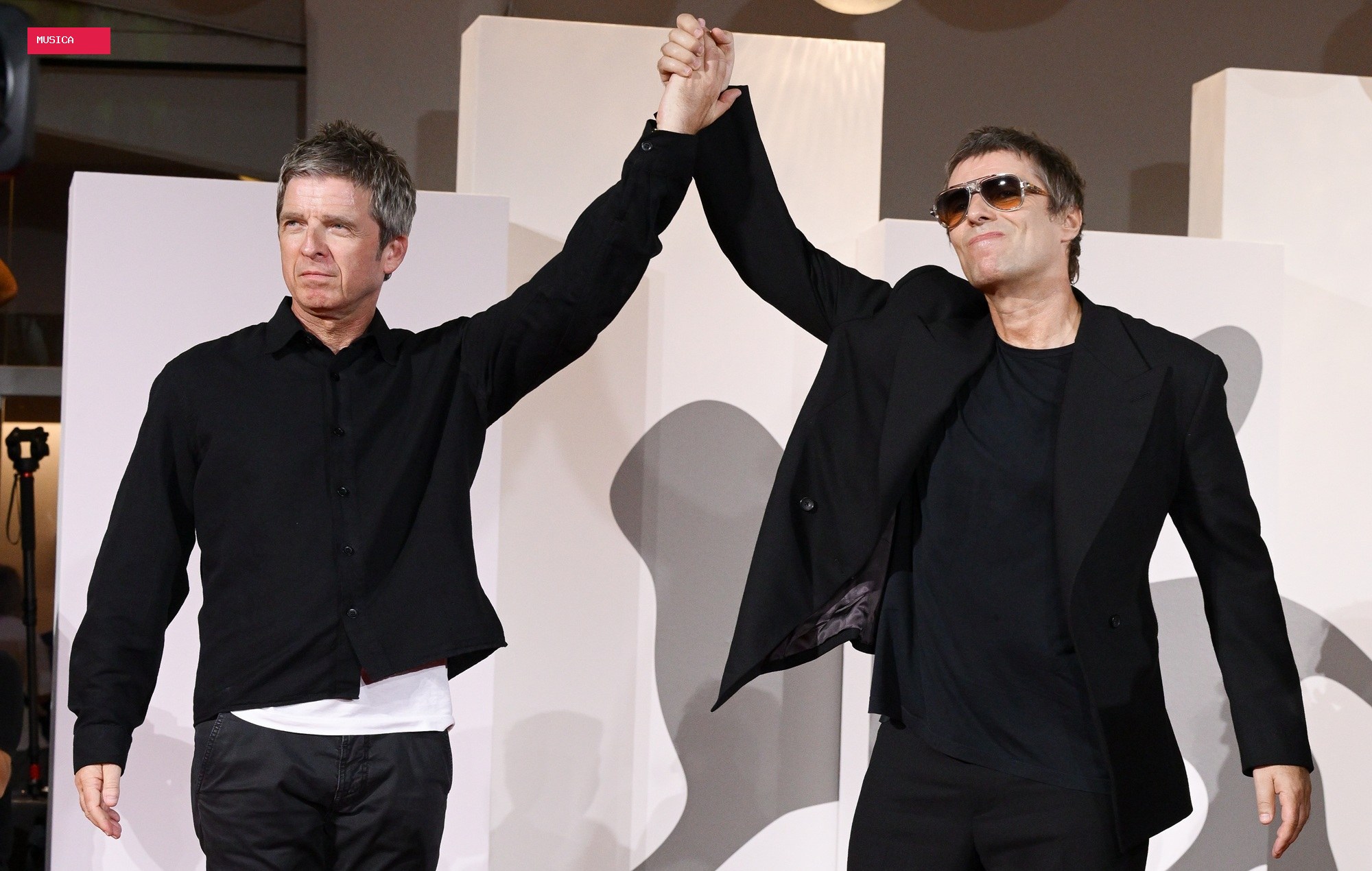 Watch Noel and Liam Gallagher react to ‘Oasis: Don’t Look Back In Anger’ doc getting eight minute standing