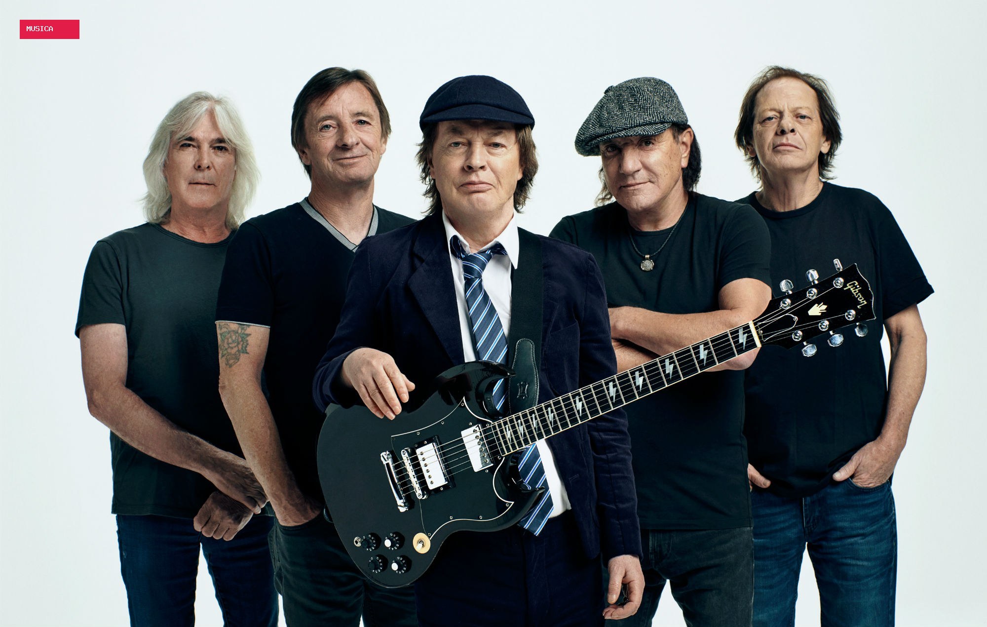 Watch AC/DC’s Angus Young sign fan’s baby