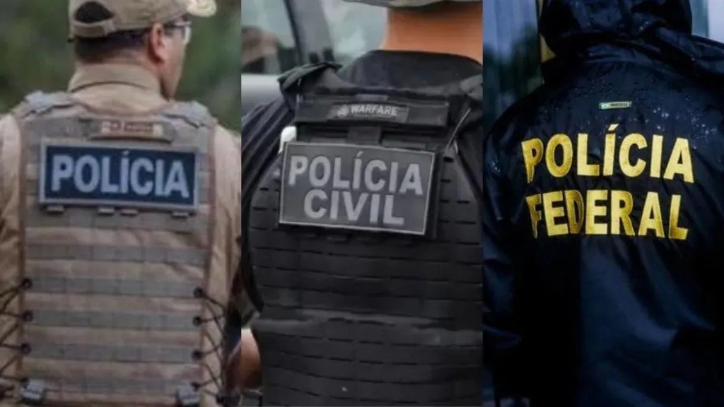 Agentes da Polícia Militar, da Polícia Civil e da Polícia Federal de costas, com coletes identificados